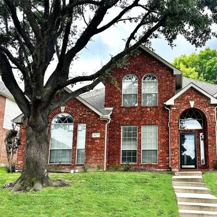 Rent this 4 bed house on 1437 Hollow Ridge Drive in Carrollton, TX 75007