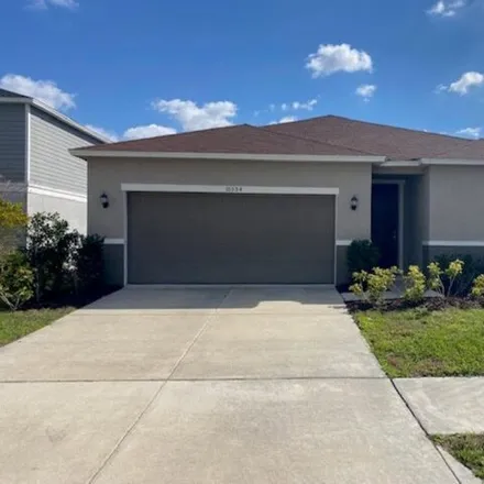Rent this 4 bed house on 10572 Laguna Plains Drive in Hillsborough County, FL 33578