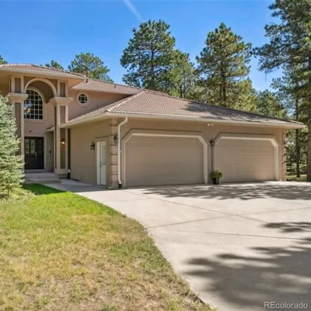 Buy this 5 bed house on 1303 Embassy Court in El Paso County, CO 80132