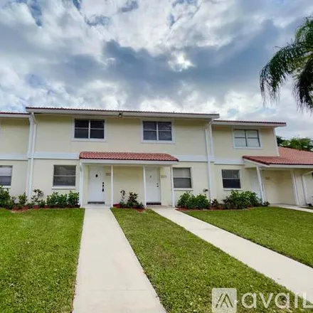 Rent this 2 bed townhouse on 6491 Boca Cir