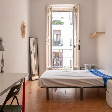 Rent this 4 bed room on Calle de San Felipe Neri in 4, 28013 Madrid