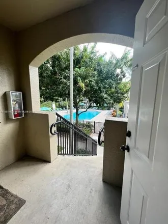 Rent this 2 bed condo on Garrett Academy in West Sample Road, Coral Springs