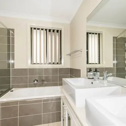 Rent this 4 bed apartment on Greenwood Parkway in Jordan Springs NSW 2747, Australia