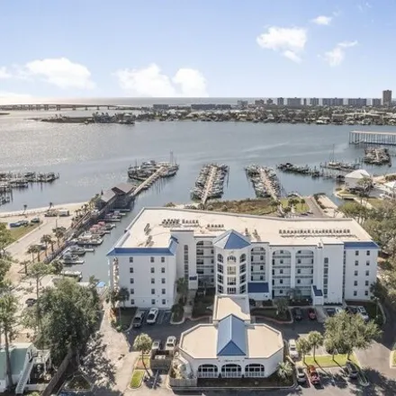 Buy this 4 bed condo on HARBOR COVE in 27282 Canal Road, Orange Beach