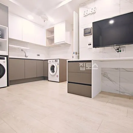 Rent this 2 bed apartment on 부산광역시 수영구 광안동 1055-60