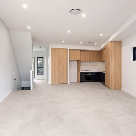 Rent this 4 bed apartment on Jack O'Sullivan Road in Moorebank NSW 2170, Australia