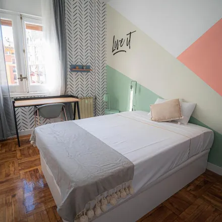 Rent this 12 bed apartment on Calle de Luchana in 38, 28010 Madrid
