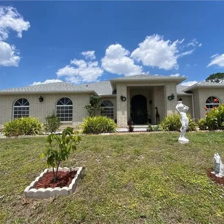 Buy this 3 bed house on 1808 Golfside Village Drive in Lehigh Acres, FL 33936