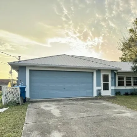 Buy this 3 bed house on 1972 Pirate Avenue Southeast in Palm Bay, FL 32909