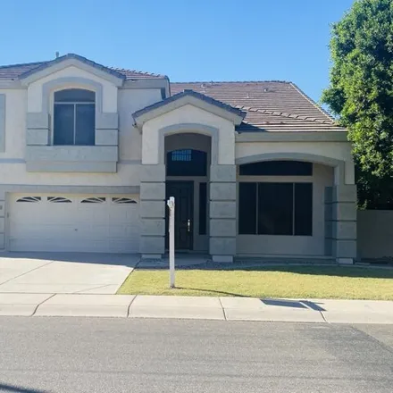 Rent this 4 bed house on 504 North Swallow Lane in Gilbert, AZ 85234
