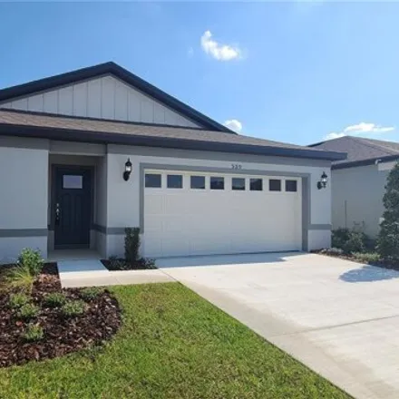 Rent this 4 bed house on Pine Tree Boulevard in Lake Alfred, Polk County