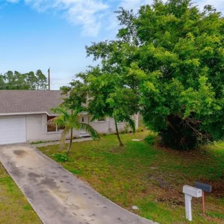 Buy this 3 bed house on 22352 Buffalo Ave in Port Charlotte, Florida
