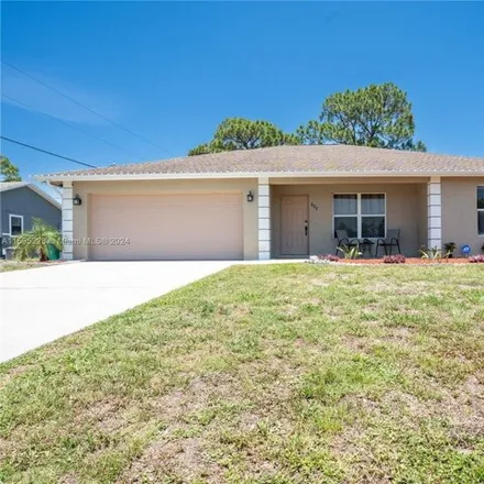 Buy this 3 bed house on 945 Southwest Longfellow Road in Port Saint Lucie, FL 34953