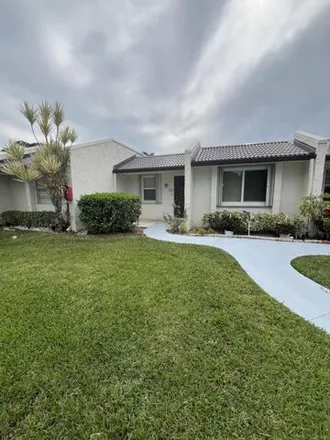 Rent this 2 bed condo on 215 Lake Constance Drive in Golden Lakes, Palm Beach County