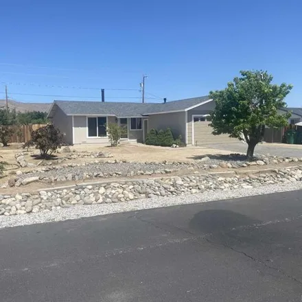 Rent this 3 bed house on 69 South Tropicana Circle in Spanish Springs, NV 89436