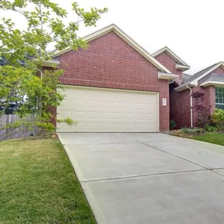Rent this 3 bed house on 13437 Raintree Drive in Montgomery County, TX 77356