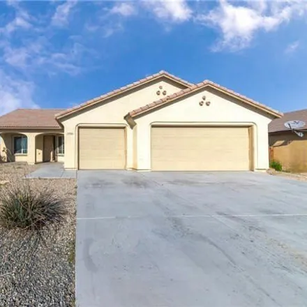 Rent this 4 bed house on 13976 Tawney Ridge Lane in Victorville, CA 92394