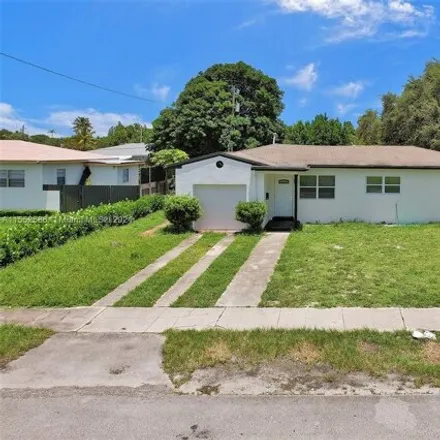 Buy this 4 bed house on 1041 Northeast 169th Street in Miami-Dade County, FL 33162