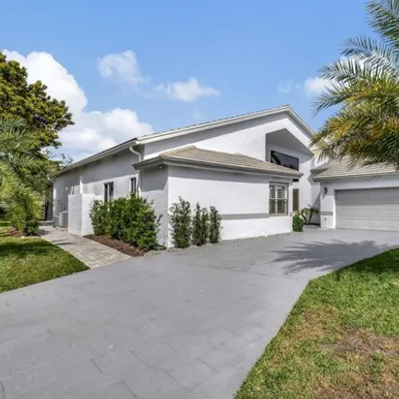 Rent this 3 bed house on 11535 Victoria Drive in Palm Beach County, FL 33437