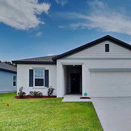 Rent this 4 bed house on Spruce Creek Drive in Lakeland, FL 33811