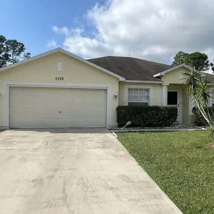 Rent this 3 bed house on 5533 West Lundy Circle South in Port Saint Lucie, FL 34986