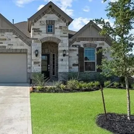 Buy this 3 bed house on Climbing Gardens Court in Conroe, TX 77301