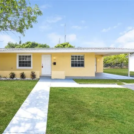 Rent this 3 bed house on 1351 Nw 51st Ave in Lauderhill, Florida