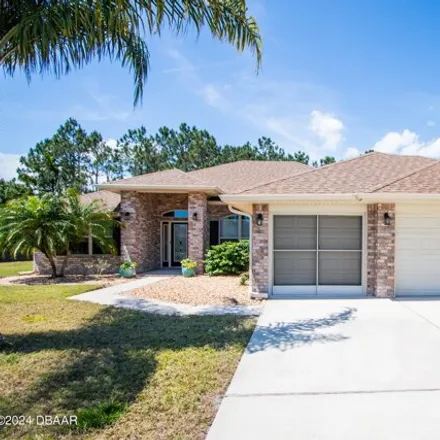 Buy this 4 bed house on 556 Bayberry Lakes Boulevard in Daytona Beach, FL 32124