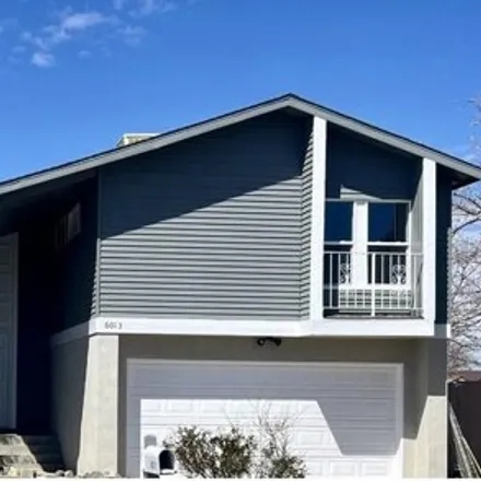 Buy this 4 bed house on 6099 Unitas Court Northwest in Bernalillo County, NM 87114