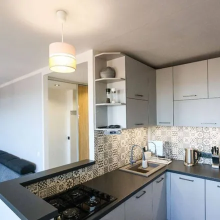 Rent this 4 bed apartment on Długa in 41-506 Chorzów, Poland