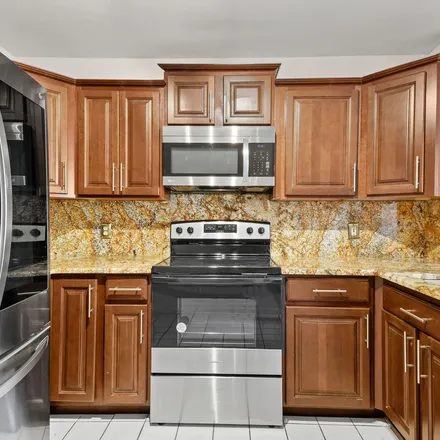 Rent this 3 bed apartment on 9839 Watermill Circle in Sun Valley, Palm Beach County