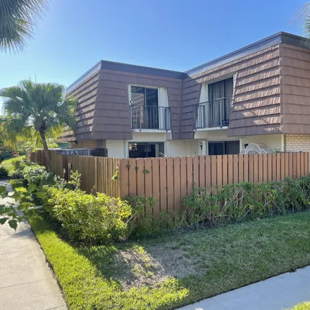 Buy this 2 bed townhouse on 3049 30th Court in Jupiter, FL 33477