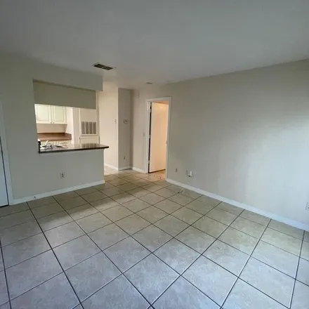 Rent this 1 bed apartment on 11668 College Park Trail in Alafaya, Orange County