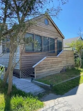 Rent this 3 bed house on 295 Cottage Walk in Village of Ocean Beach, Islip