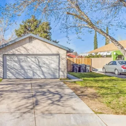 Rent this 3 bed house on 1523 East Avenue J3 in Lancaster, CA 93535