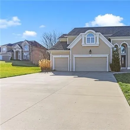 Buy this 4 bed house on 5701 Northeast Timber Hills Drive in Lee's Summit, MO 64064