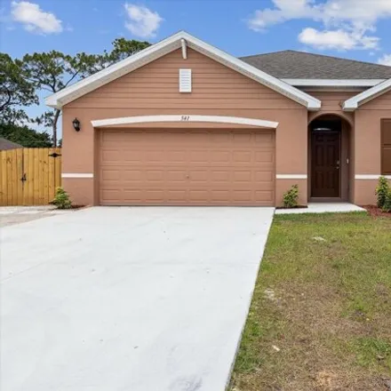 Rent this 4 bed house on 537 Dinner Street Northeast in Palm Bay, FL 32907