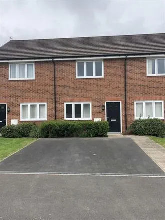 Rent this 2 bed townhouse on 7 Greenfinch Grove in Oakwood, Warrington