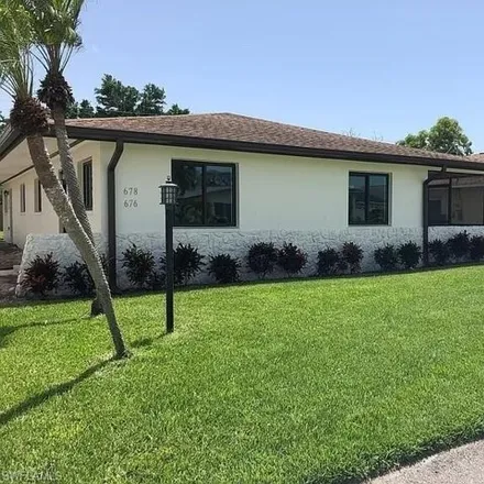Rent this 2 bed house on 676 108th Avenue North in Collier County, FL 34108