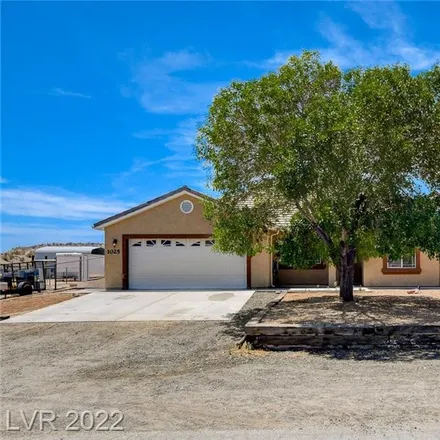 Rent this 4 bed house on 2300 East McKnight Avenue in Clark County, NV 89025