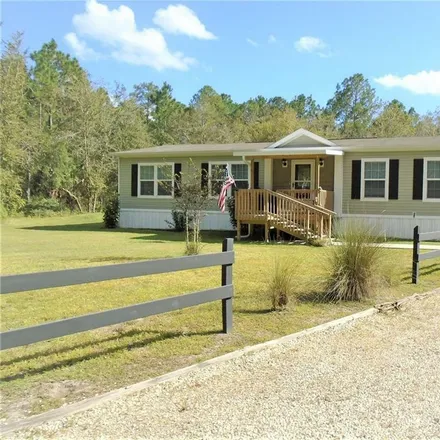 Buy this 3 bed house on 5649 Palm Avenue in Flagler County, FL 32110