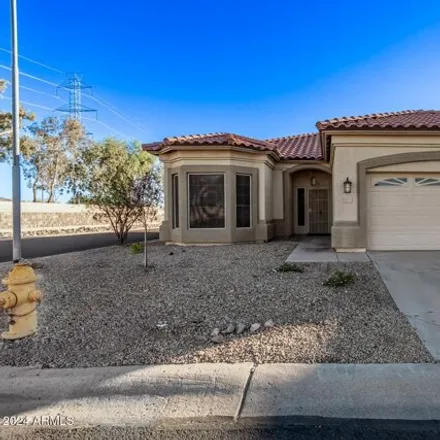 Rent this 3 bed house on 11515 W Gnatcatcher Ln in Surprise, Arizona