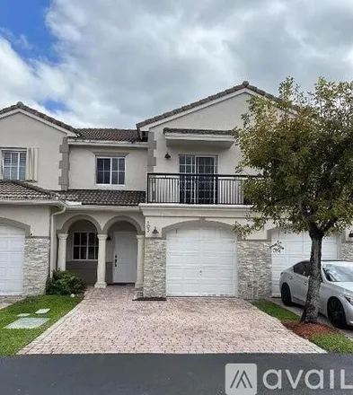 Rent this 4 bed townhouse on 8401 SW 124th Ave