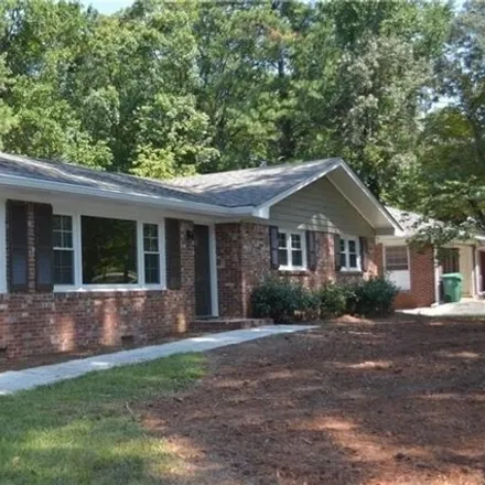 Rent this 3 bed house on 3998 Flowerland Drive Northeast in Brookhaven, GA 30319