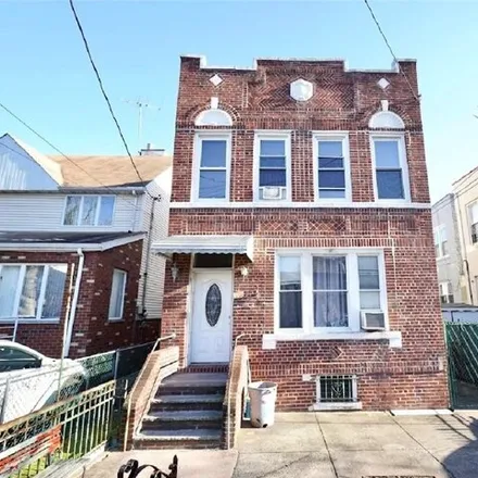 Buy this 7 bed house on 8671 24th Avenue in New York, NY 11214