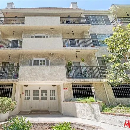 Buy this 2 bed condo on 317 South Holt Avenue in Los Angeles, CA 90048