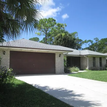 Image 1 - 418 Hurst Road Northeast, Palm Bay, FL 32907, USA - House for rent