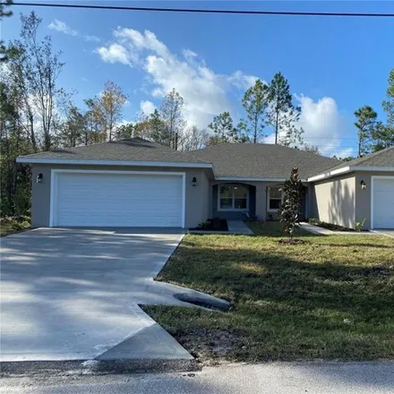 Rent this 4 bed house on 19 Karas Trail in Palm Coast, FL 32164
