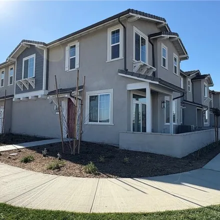 Rent this 3 bed house on 4096 E Lily Paseo Unit 102 in Ontario, California