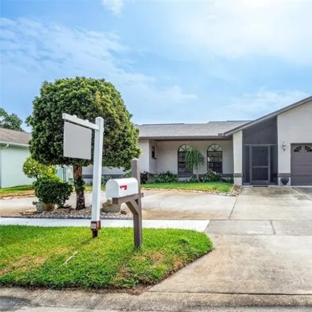 Buy this 4 bed house on 2241 Cypress Point Drive East in Pinellas County, FL 33763